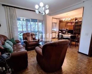 Living room of Flat for sale in  Madrid Capital  with Heating, Parquet flooring and Terrace