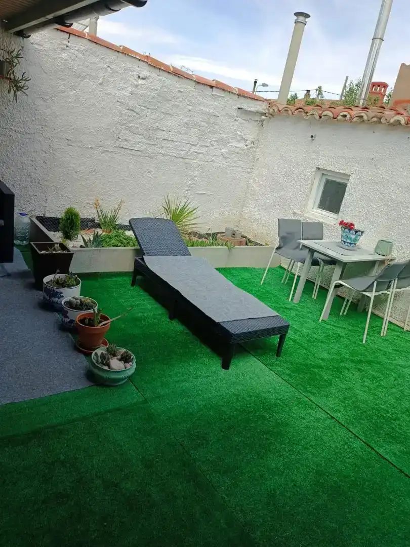 Terrassa de Casa adosada en venda en Escatrón amb Aire condicionat, Jardí privat i Moblat