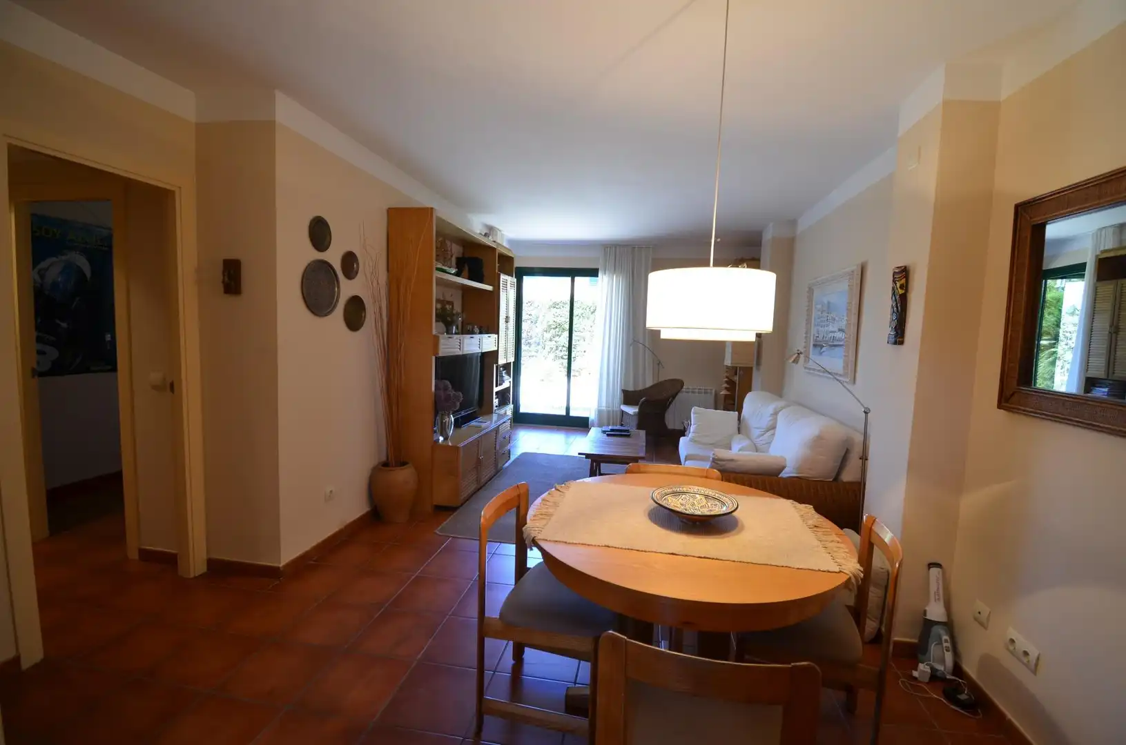 Wohnzimmer von Erdgeschoss zum Verkauf in L'Ametlla de Mar  mit Klimaanlage, Privatgarten und Terrasse