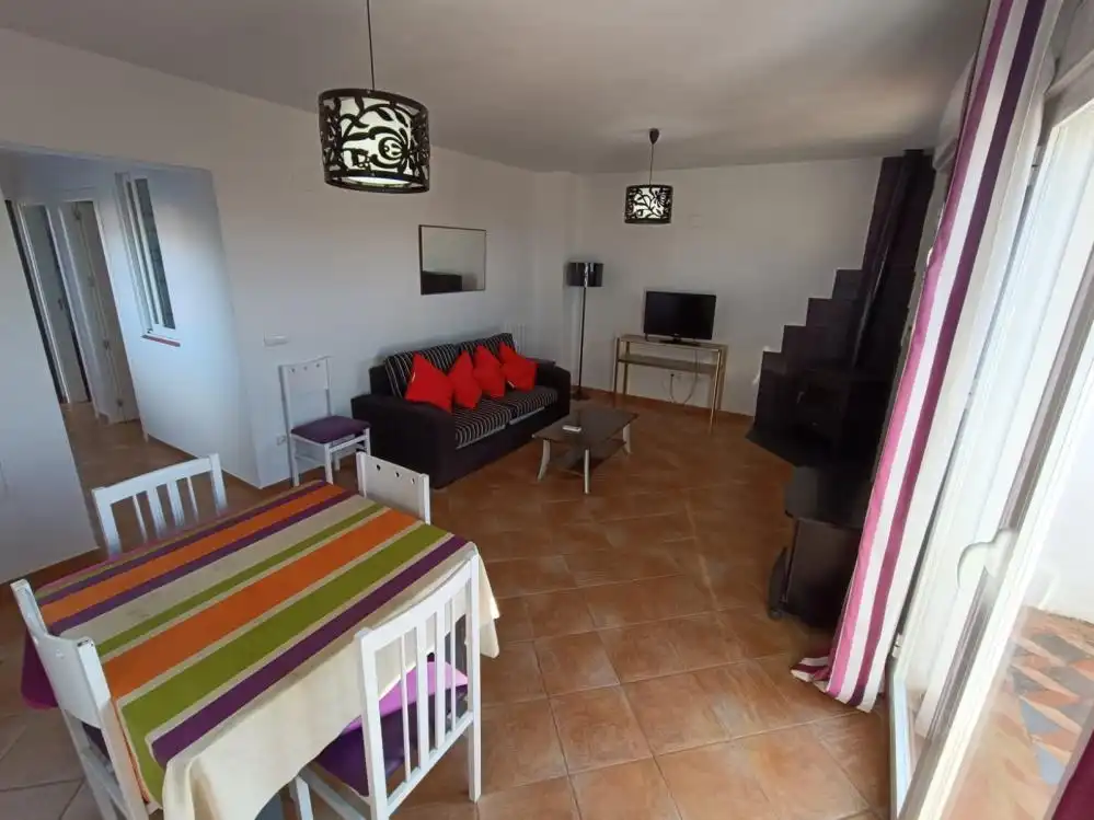 Sala d'estar de Casa o xalet en venda en Chilluévar amb Aire condicionat, Terrassa i Moblat
