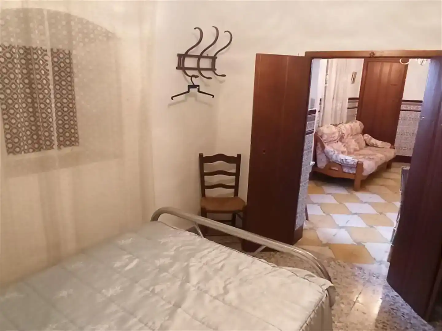 Dormitori de Casa adosada en venda en Almoharín amb Moblat i Balcó