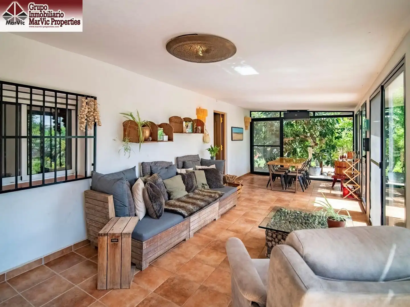 Sala d'estar de Apartament en venda en Callosa d'en Sarrià amb Aire condicionat, Jardí privat i Moblat