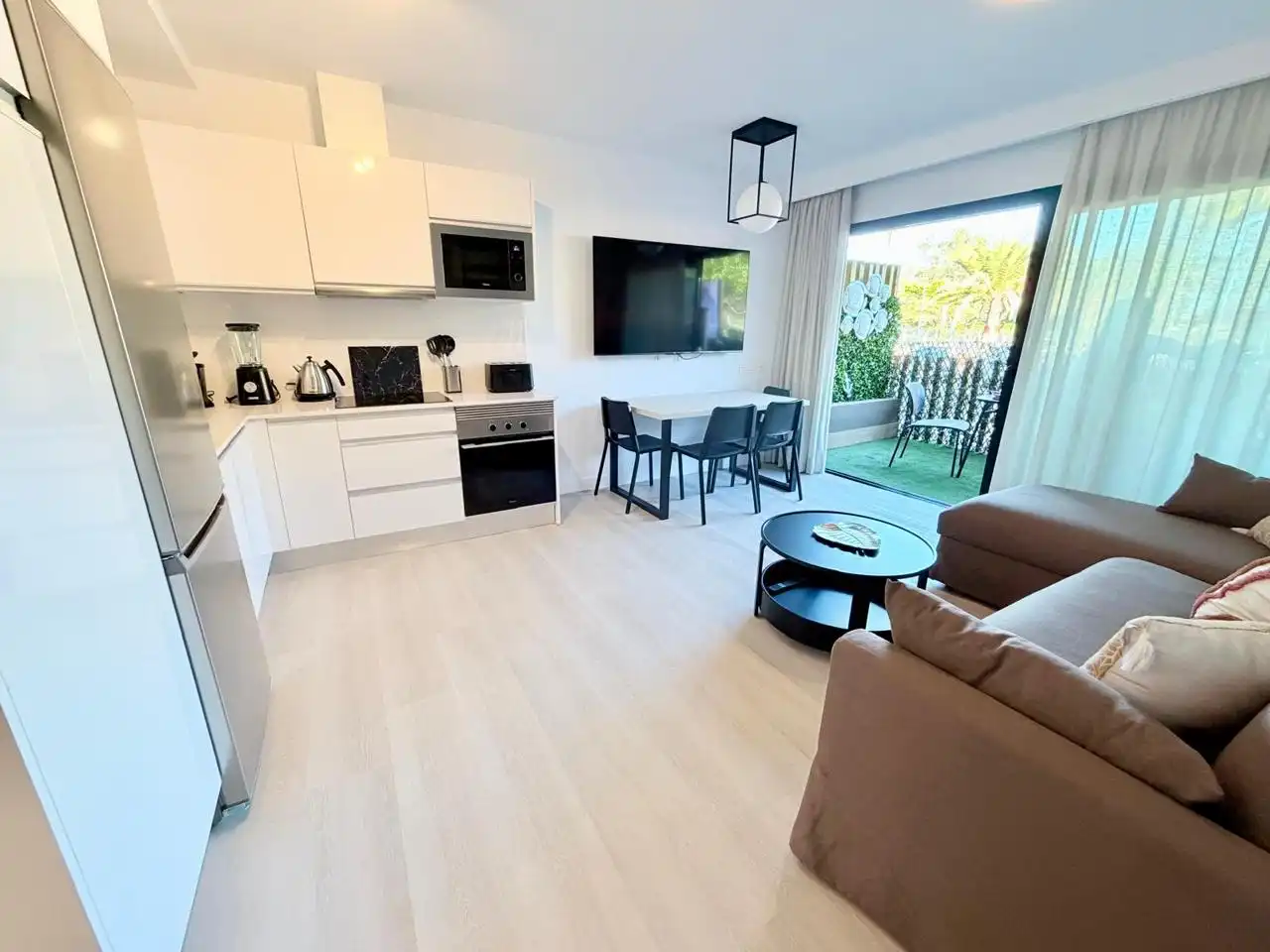 Living room of Flat for rent in Mogán  with Air Conditioner, Terrace and Furnished