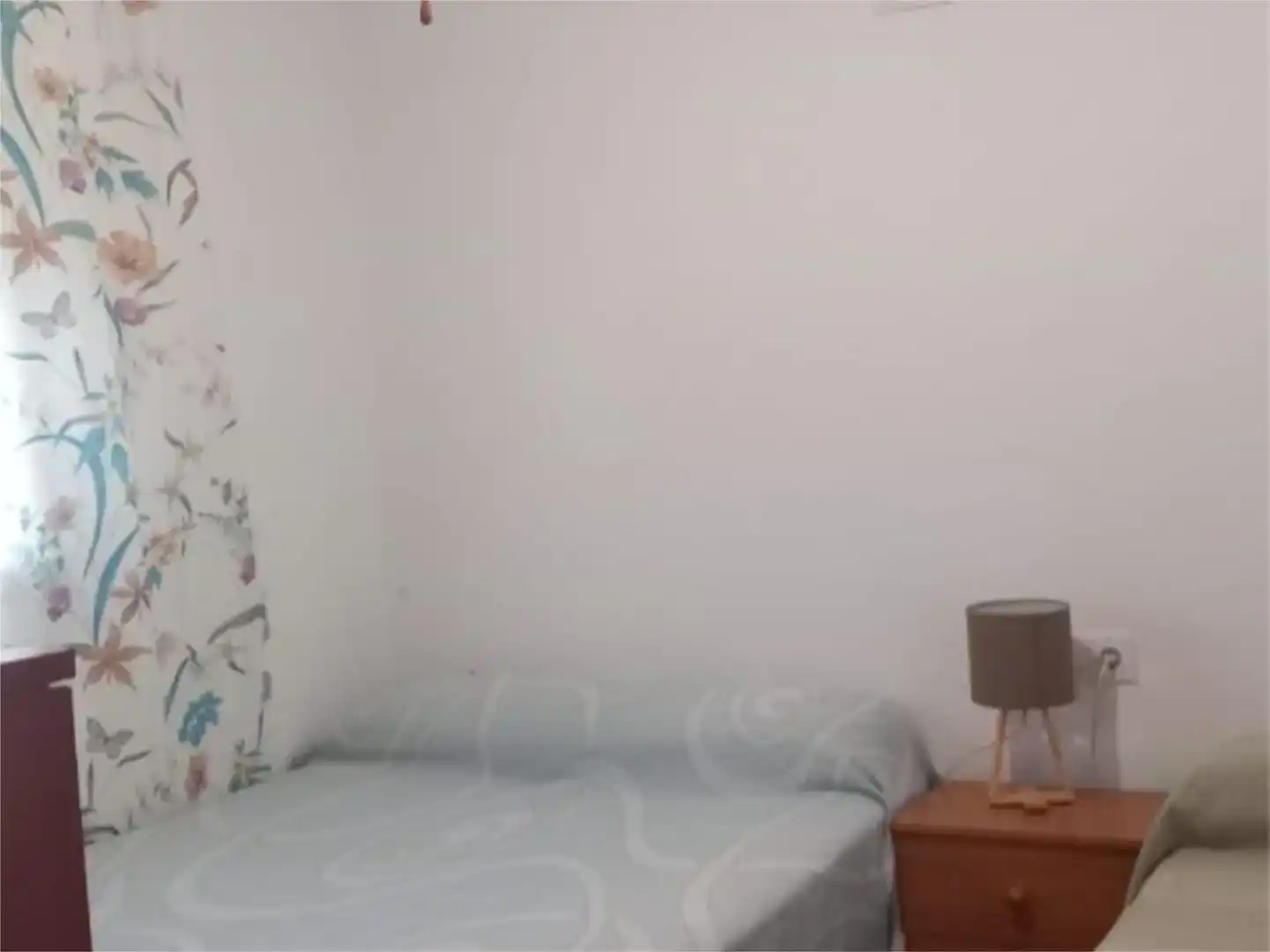Dormitori de Casa adosada de lloguer en Chipiona amb Aire condicionat i Moblat