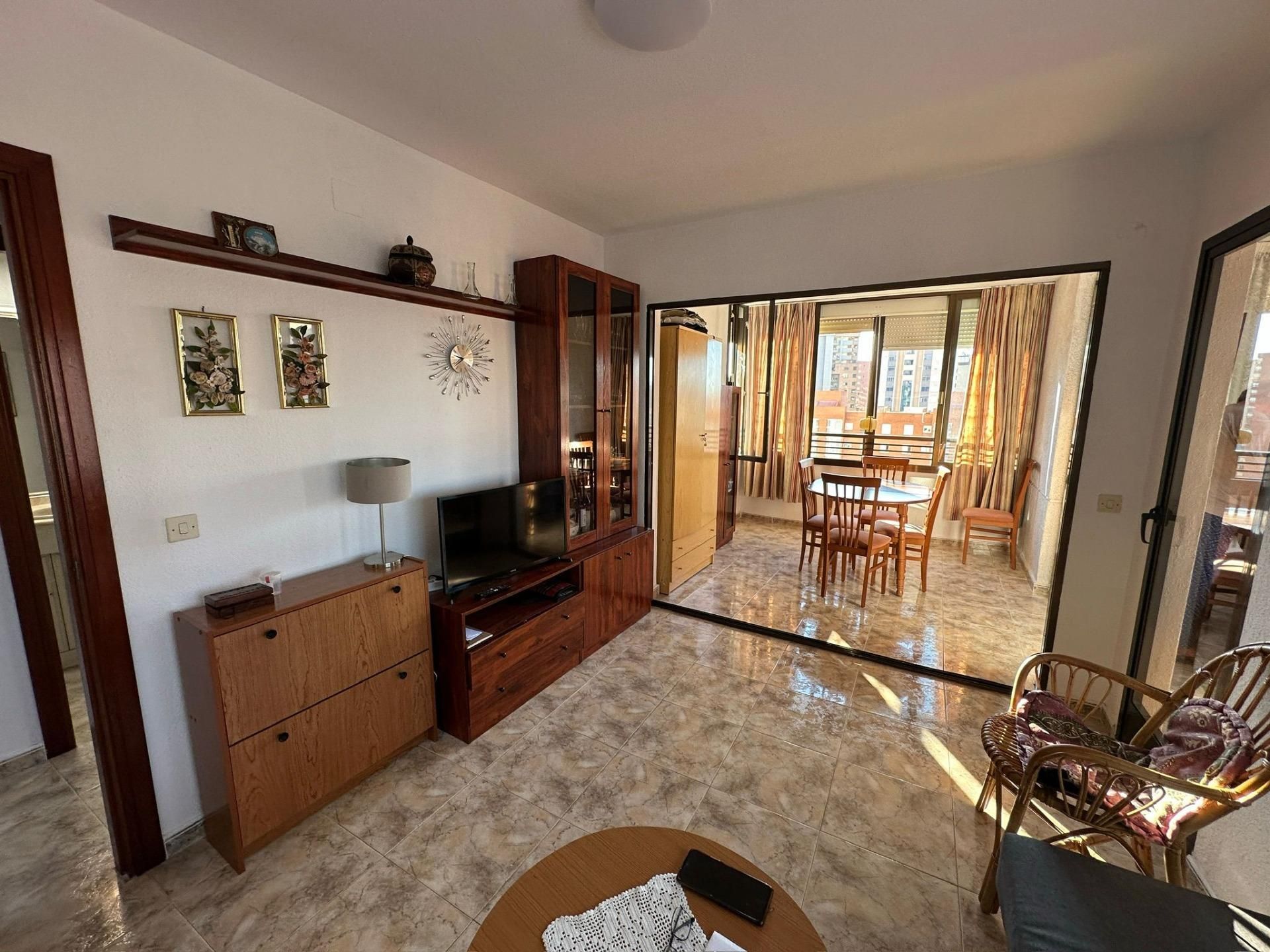 Sala d'estar de Apartament en venda en Benidorm amb Aire condicionat, Calefacció i Jardí privat
