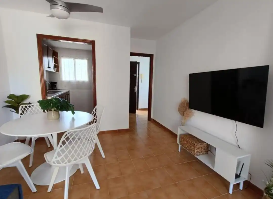 Sala d'estar de Apartament en venda en Calpe / Calp amb Aire condicionat, Terrassa i Moblat