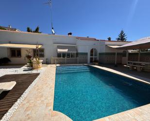 Swimming pool of House or chalet for sale in Benalmádena  with Air Conditioner, Heating and Private garden