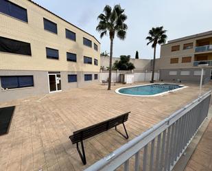 Swimming pool of Single-family semi-detached for sale in Sant Jaume d'Enveja  with Air Conditioner, Terrace and Community pool