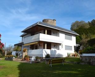 Vista exterior de Casa o xalet en venda en Miño amb Calefacció, Jardí privat i Terrassa