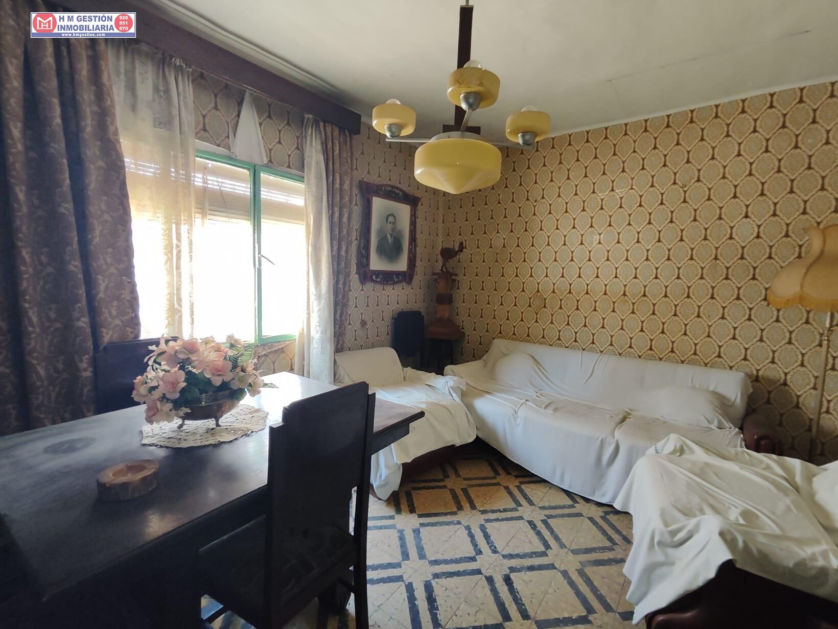 Sala d'estar de Casa adosada en venda en Alcázar de San Juan amb Terrassa