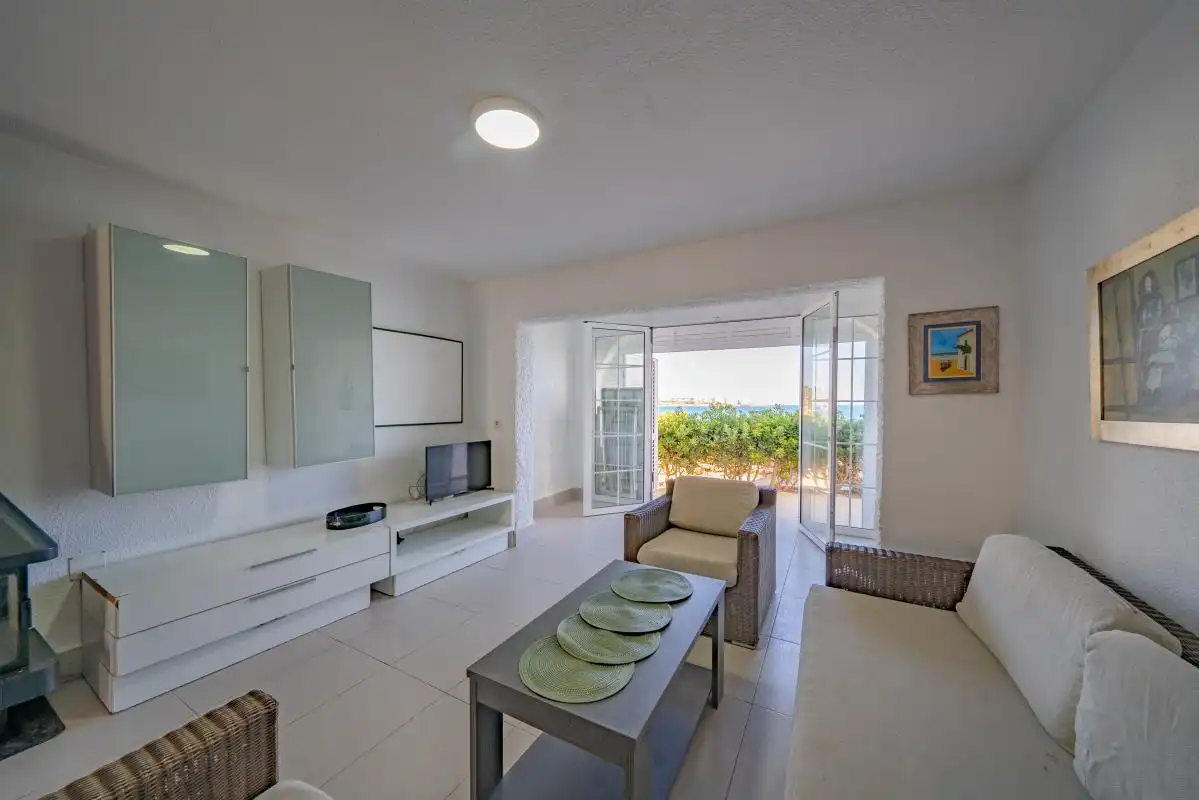 Sala de estar de Casa adosada en venta en Orihuela con Calefacción, Jardín privado y Piscina