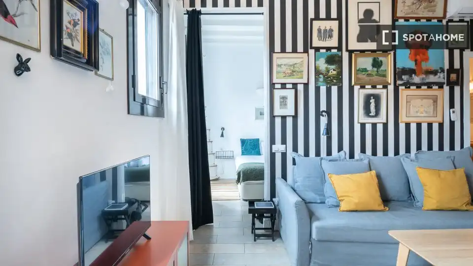 Sala d'estar de Estudi per a compartir en Barcelona amb Aire condicionat, Terrassa i Moblat