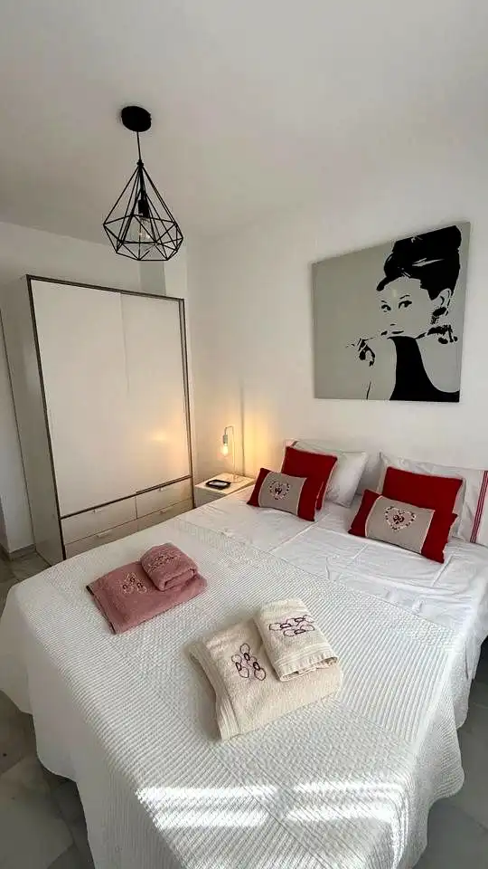 Habitación de Casa adosada en venta en Málaga con Aire acondicionado y Piscina comunitaria