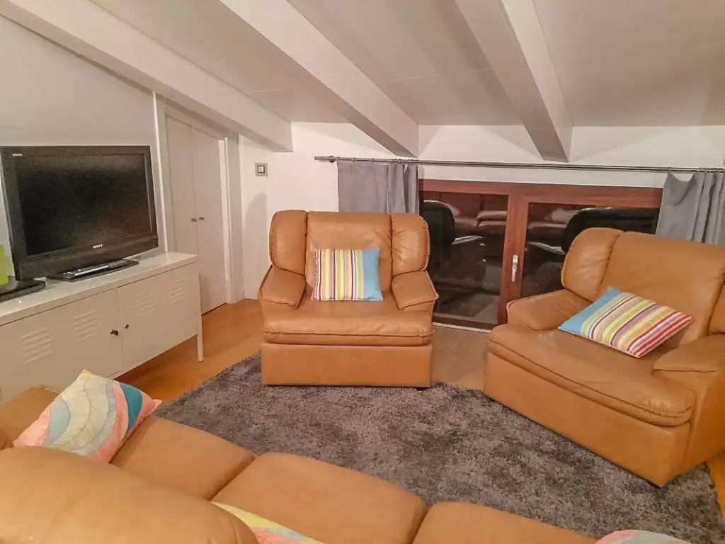 Sala d'estar de Casa adosada en venda en Pollença