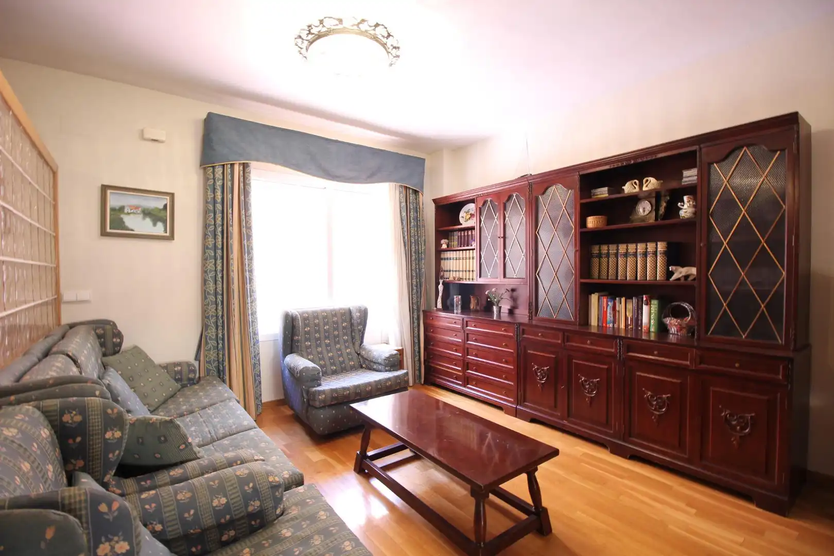 Sala d'estar de Casa adosada en venda en Sagunto / Sagunt amb Aire condicionat, Calefacció i Terrassa