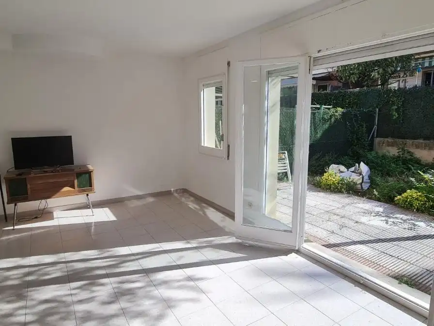 Sala de estar de Casa adosada en venta en Palau