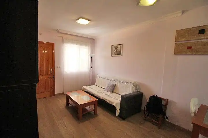 Sala de estar de Casa o chalet en venta en Guardamar del Segura con Aire acondicionado, Jardín privado y Terraza