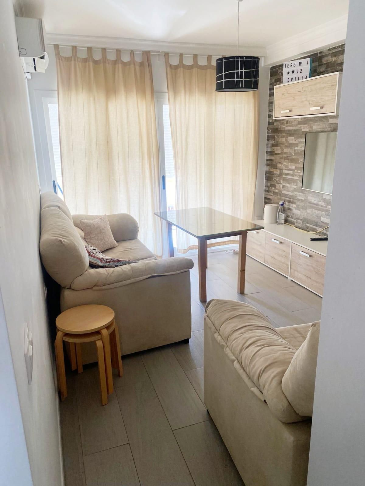 Living room of Flat for sale in  Sevilla Capital  with Air Conditioner and Terrace