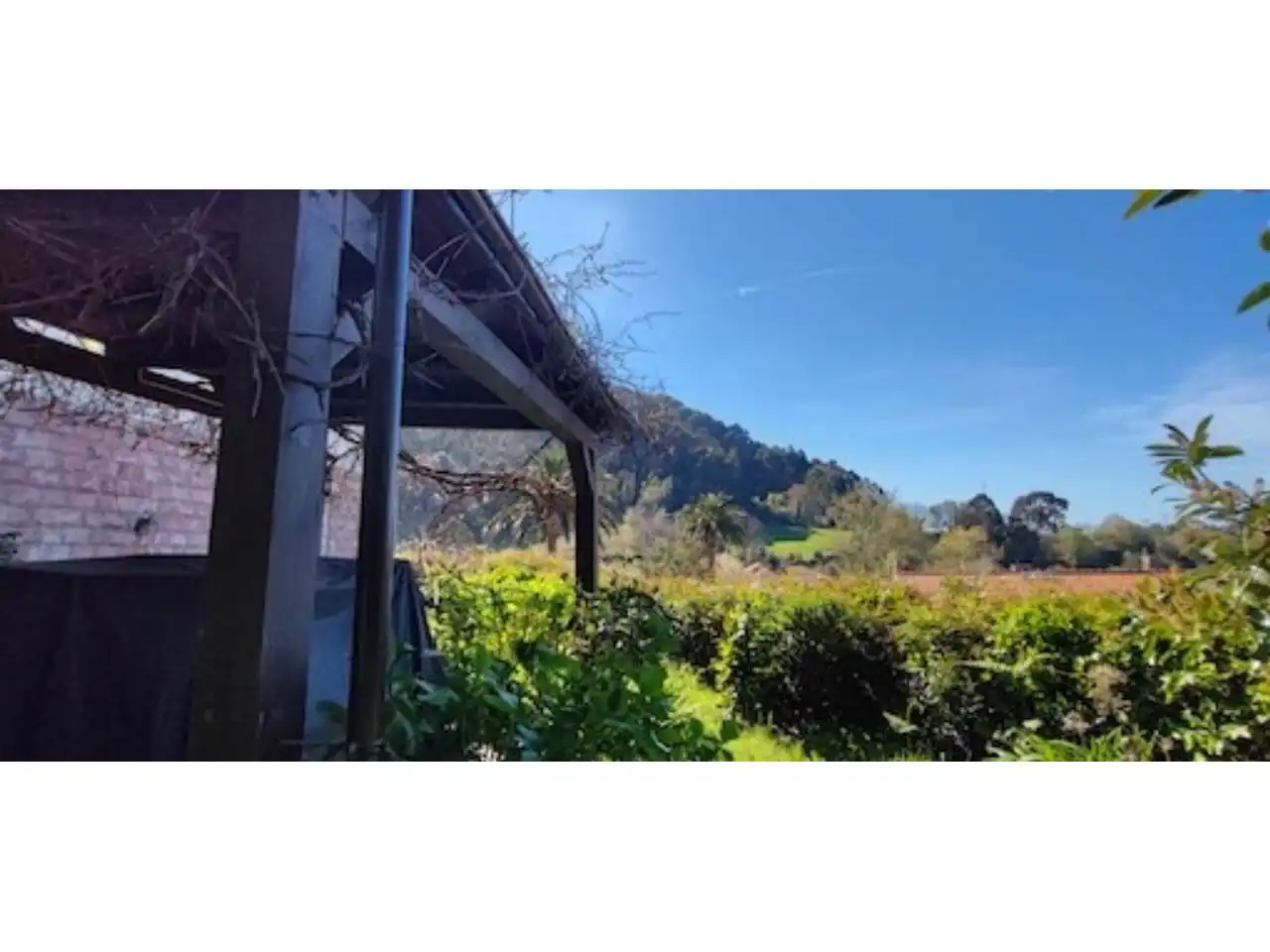 Garten von Einfamilien-Reihenhaus zum Verkauf in Llanes mit Heizung, Privatgarten und Terrasse