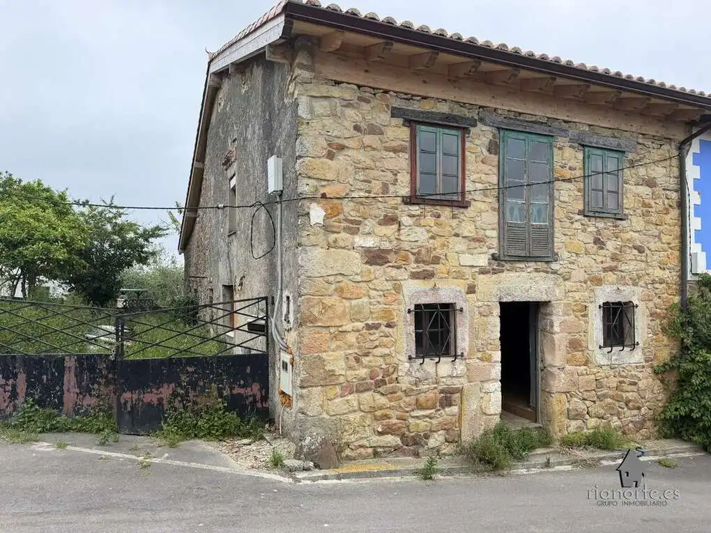 Vista exterior de Casa adosada en venda en Villaviciosa amb Jardí privat