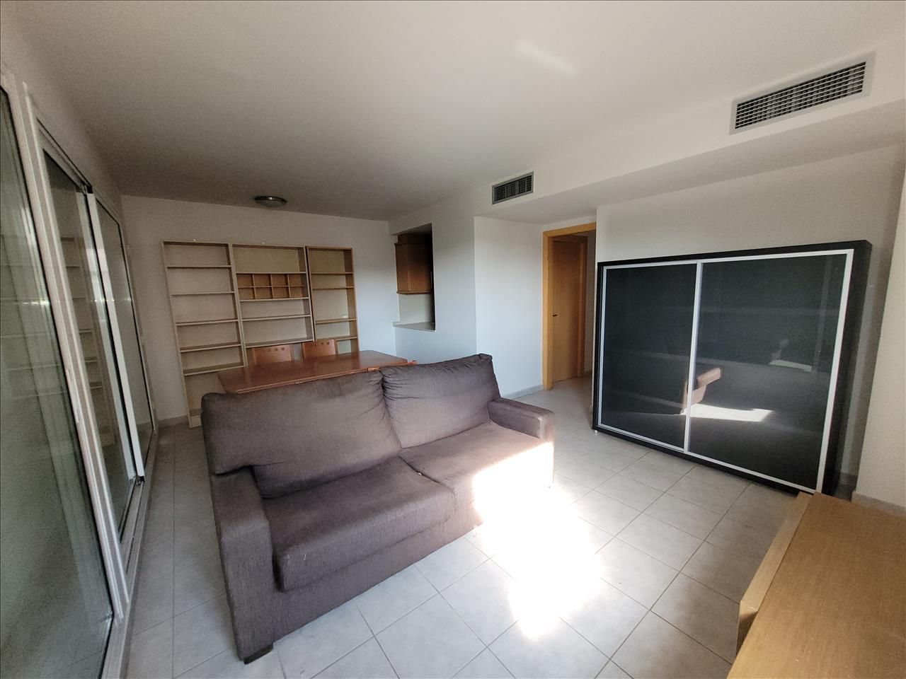 Sala d'estar de Apartament en venda en Llançà amb Aire condicionat, Jardí privat i Terrassa