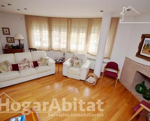 Sala d'estar de Casa adosada en venda en Vila-real amb Aire condicionat i Terrassa