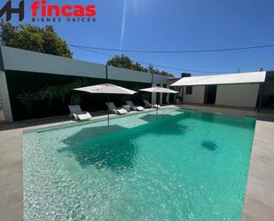 Swimming pool of Country house for sale in Dos Hermanas  with Air Conditioner, Terrace and Swimming Pool