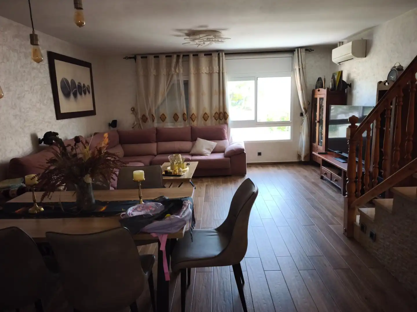 Sala d'estar de Casa adosada en venda en La Ràpita amb Jardí privat, Terrassa i Traster