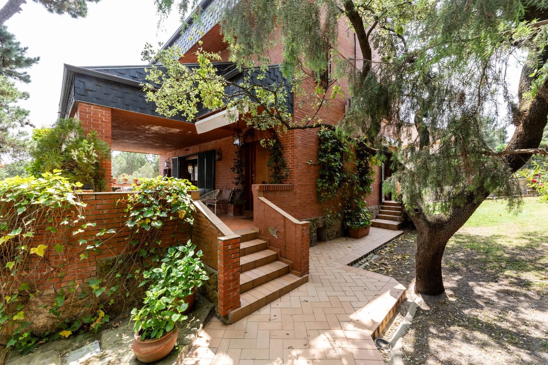 Vista exterior de Casa o xalet en venda en Galapagar amb Calefacció, Jardí privat i Piscina comunitària