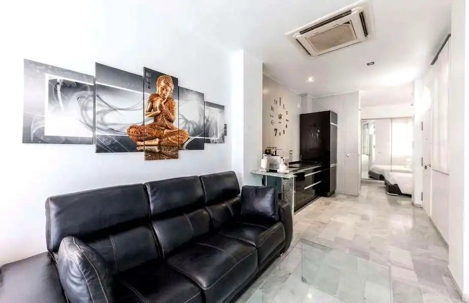 Sala d'estar de Àtic de lloguer en Sevilla amb Aire condicionat, Moblat i Balcó