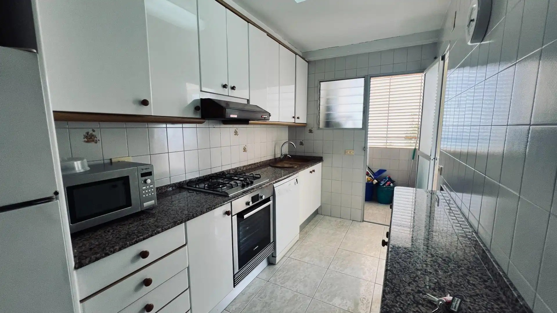 Cuina de Apartament en venda en Benicasim / Benicàssim amb Jardí privat, Terrassa i Traster