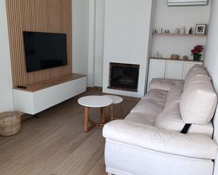 Sala d'estar de Casa adosada en venda en Málaga Capital amb Aire condicionat, Jardí privat i Terrassa