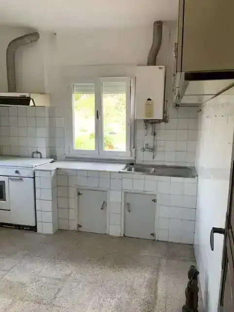 Cuina de Casa o xalet en venda en Pontevedra Capital  amb Calefacció, Jardí privat i Traster