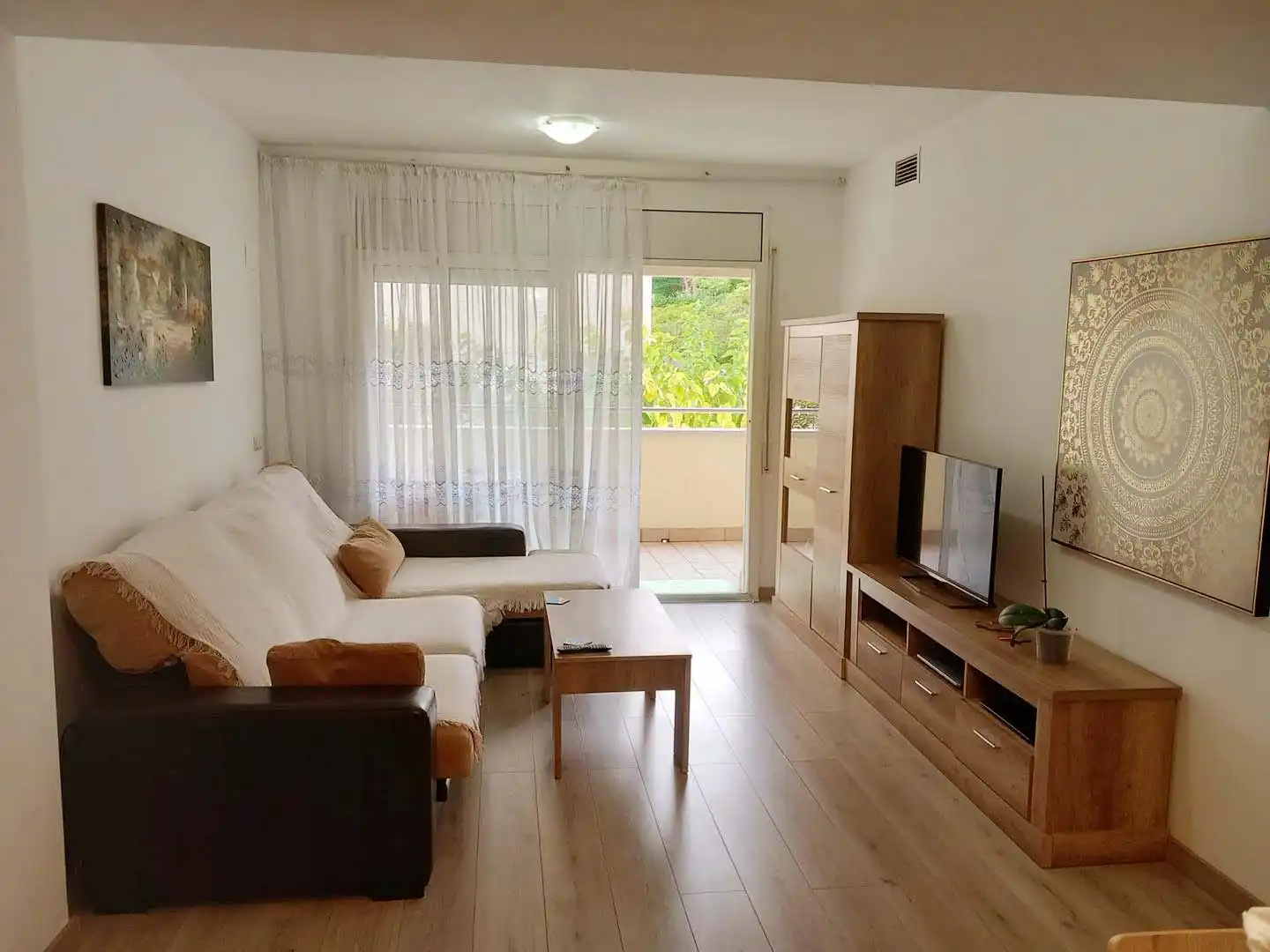Living room of Flat for sale in Lloret de Mar  with Air Conditioner, Terrace and Furnished