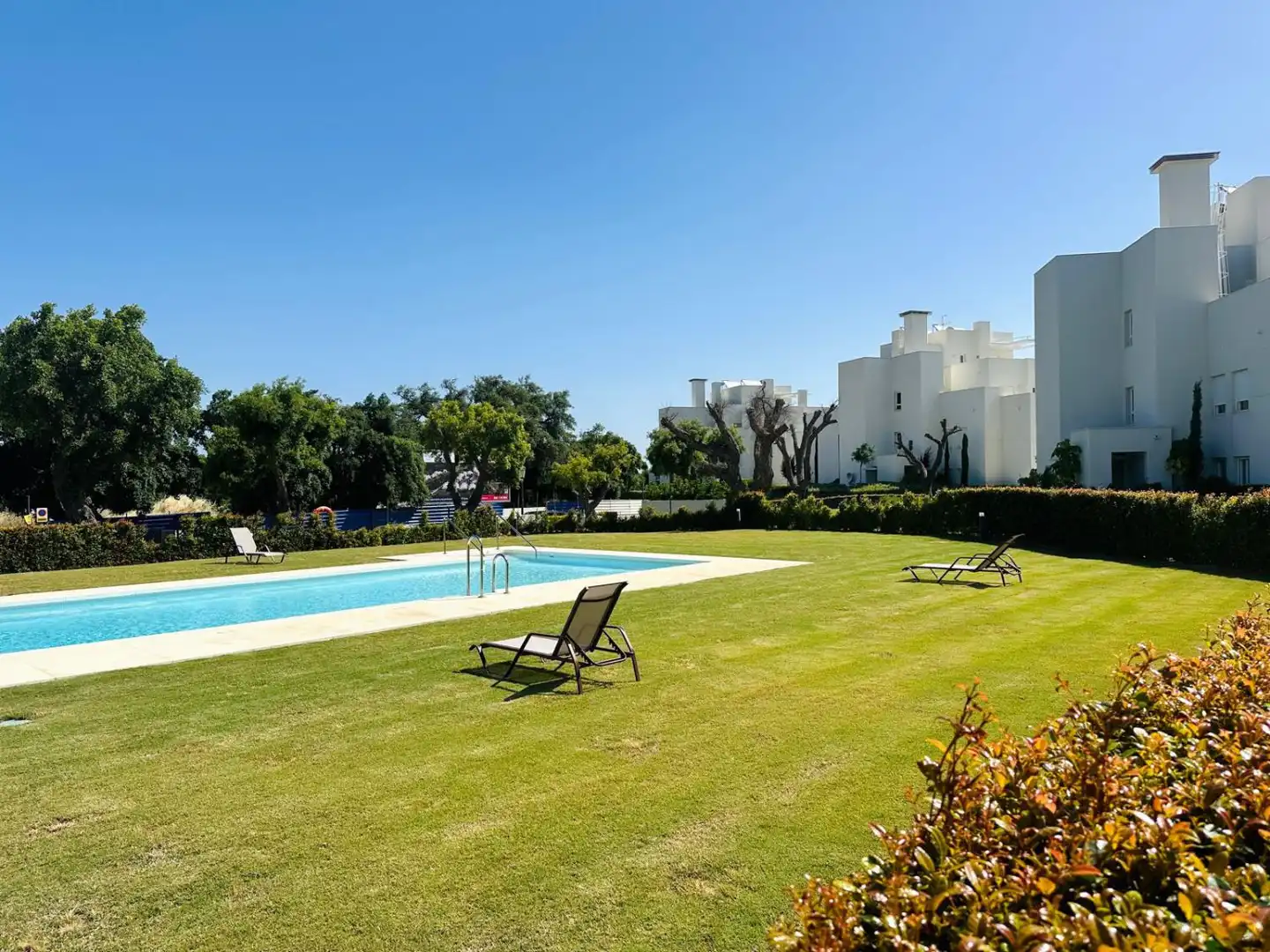 Swimming pool of Apartments for sale in Sotogrande  with Air Conditioner, Heating and Terrace