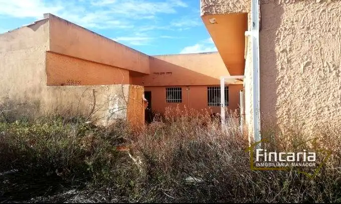 Vista exterior de Finca rústica en venda en Sa Pobla amb Parquet i Piscina comunitària