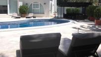 Swimming pool of House or chalet for sale in Roquetas de Mar  with Air Conditioner and Swimming Pool