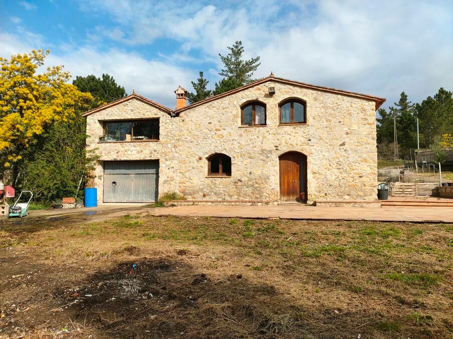 Vista exterior de Finca rústica en venda en Breda amb Calefacció, Jardí privat i Traster