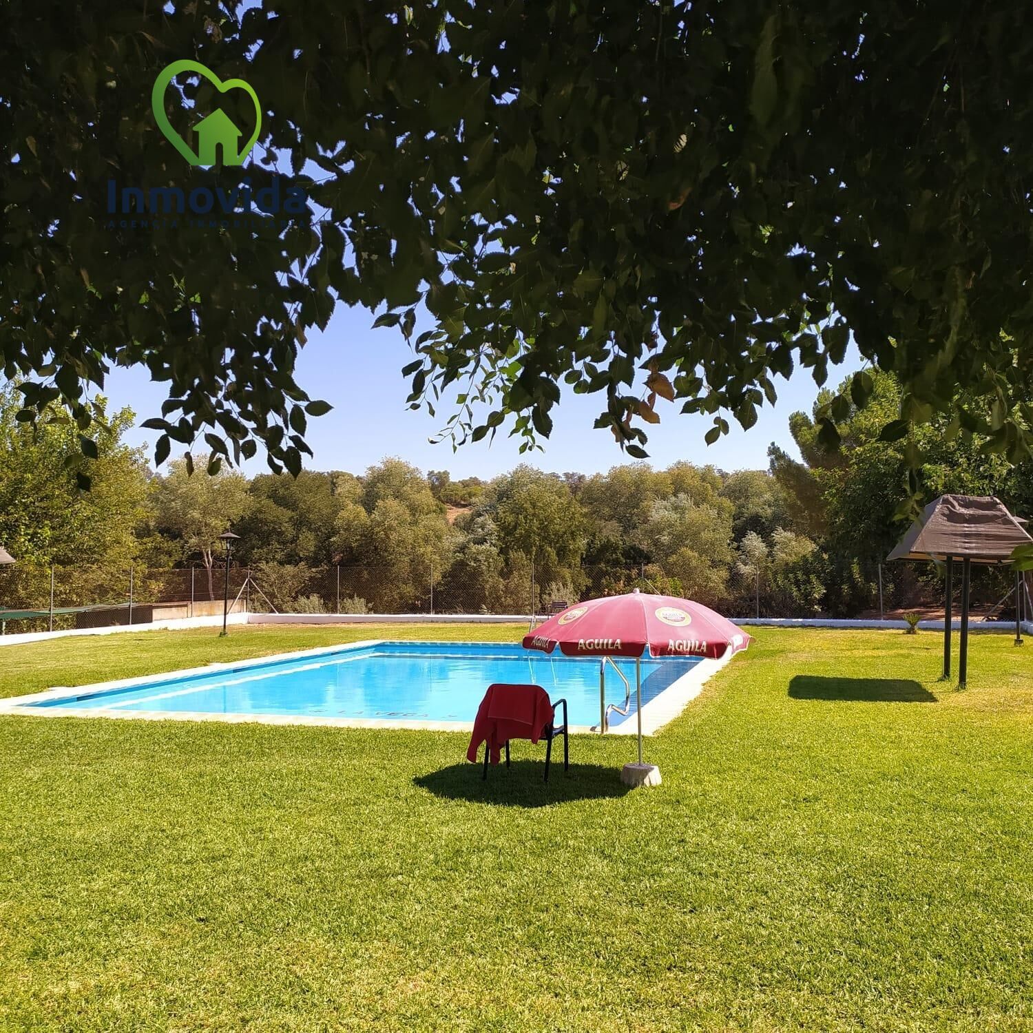 Swimming pool of Country house for sale in Posadas  with Air Conditioner, Private garden and Storage room