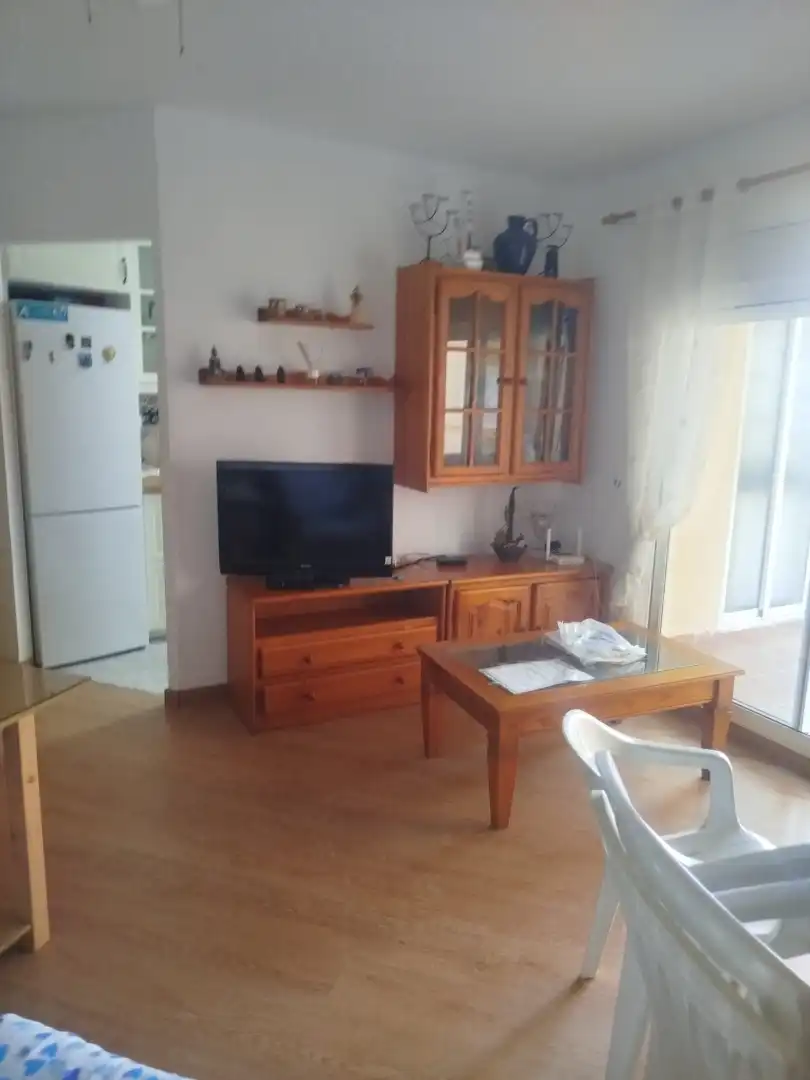 Sala d'estar de Apartament en venda en Torrenueva Costa amb Moblat