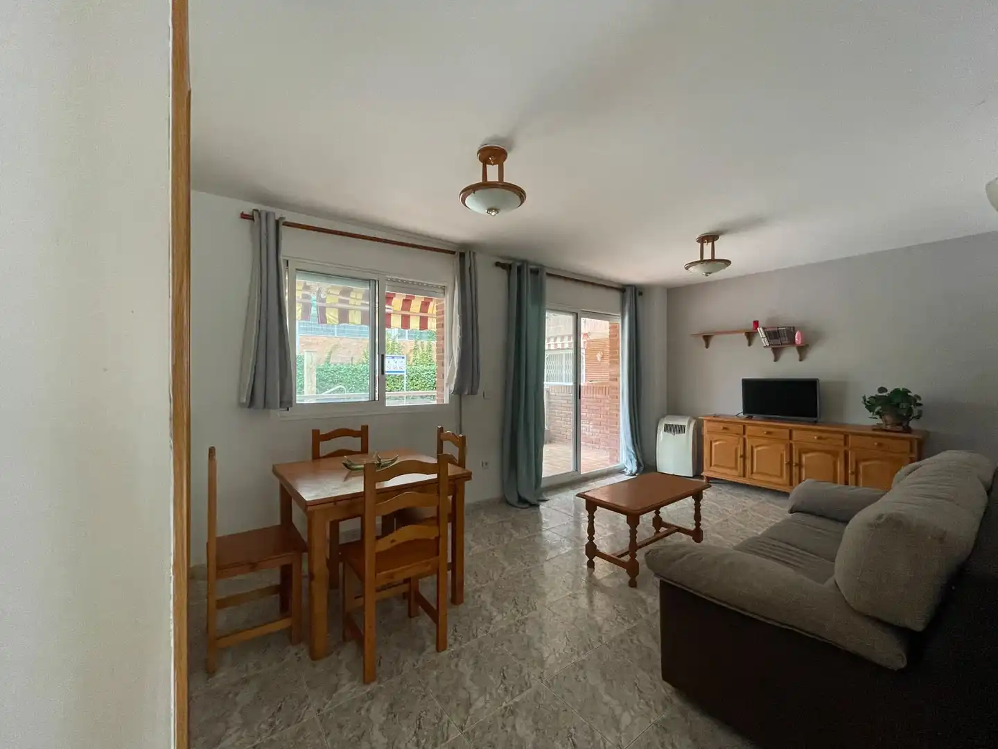 Sala d'estar de Planta baixa en venda en Salou amb Jardí privat, Terrassa i Moblat