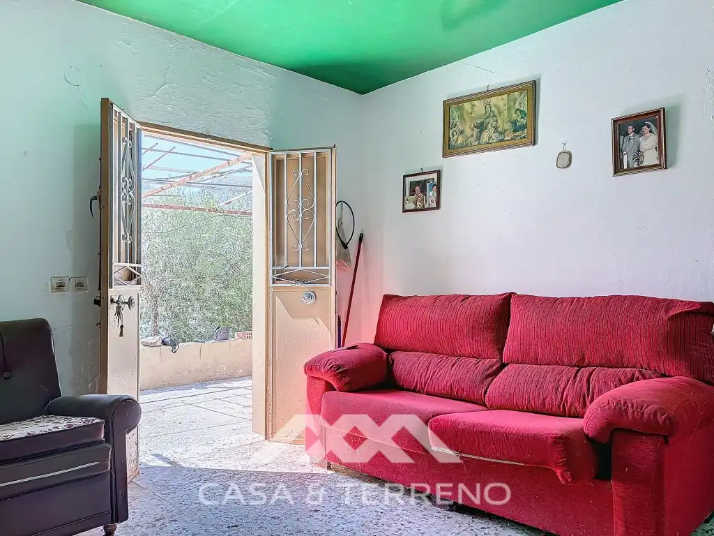 Wohnzimmer von Country house zum Verkauf in Comares mit Privatgarten und Terrasse