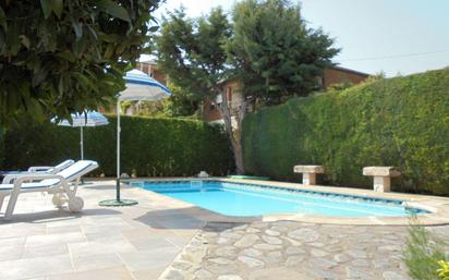 Swimming pool of House or chalet for sale in Jadraque  with Air Conditioner, Heating and Private garden