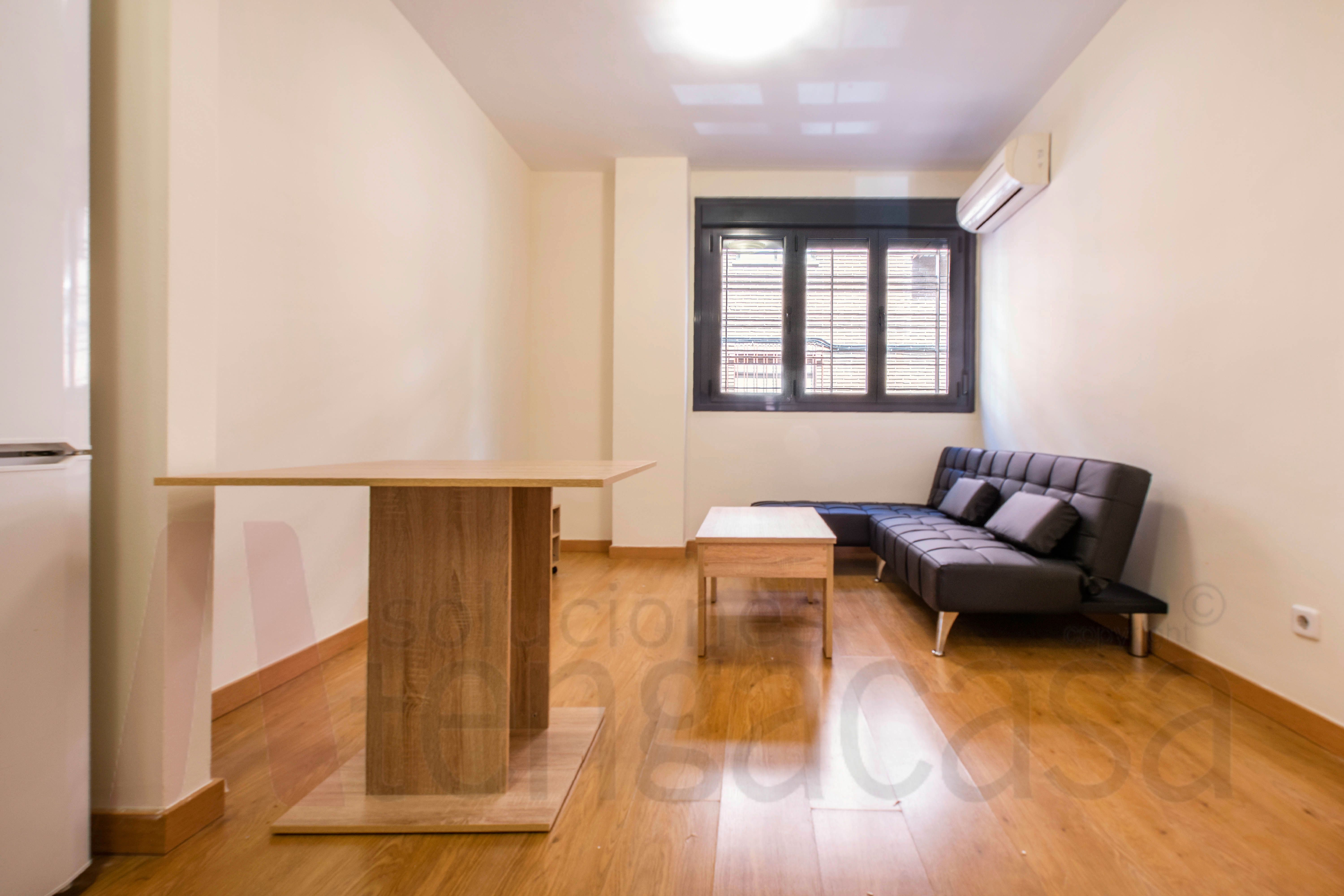 Sala de estar de Apartamento de alquiler en  Madrid Capital con Aire acondicionado, Calefacción y Parquet