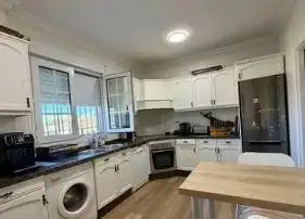 Cuina de Casa o xalet en venda en Punta Umbría amb Aire condicionat, Jardí privat i Parquet