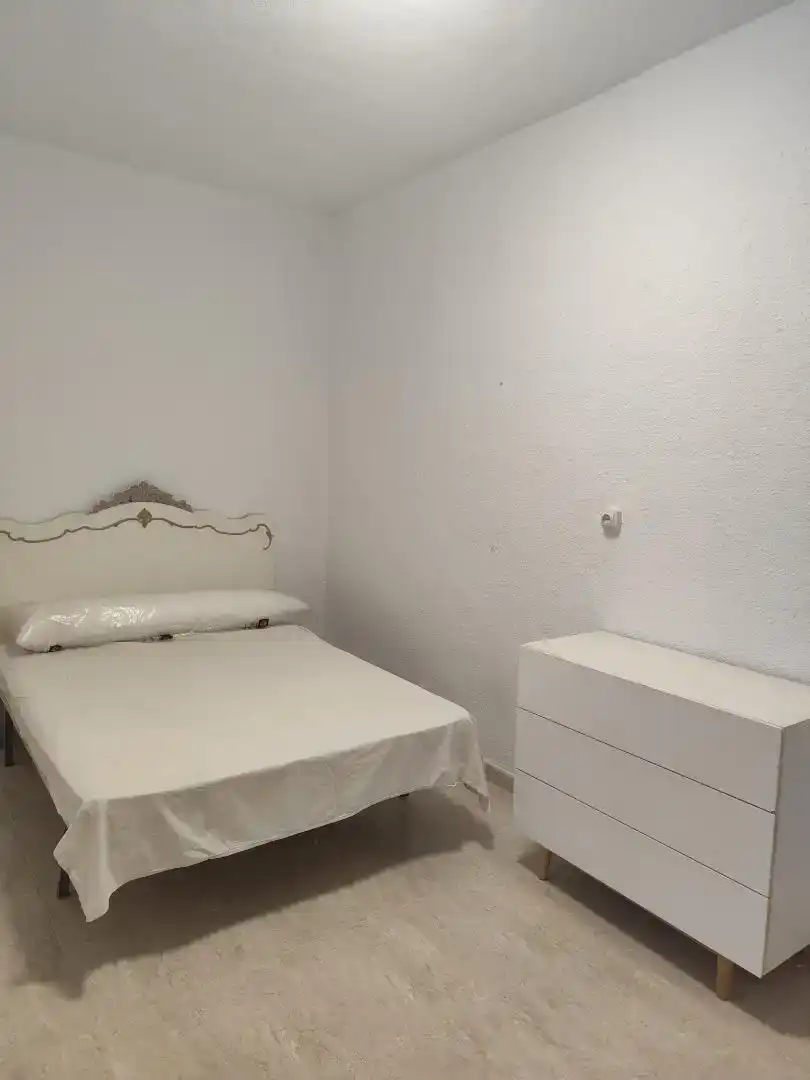 Dormitori de Casa adosada de lloguer en Almería amb Aire condicionat, Rentadora i Microones