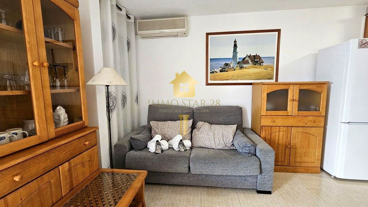 Sala d'estar de Planta baixa de lloguer en Roses amb Aire condicionat, Terrassa i Moblat