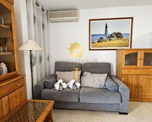 Sala d'estar de Planta baixa de lloguer en Roses amb Aire condicionat, Terrassa i Moblat