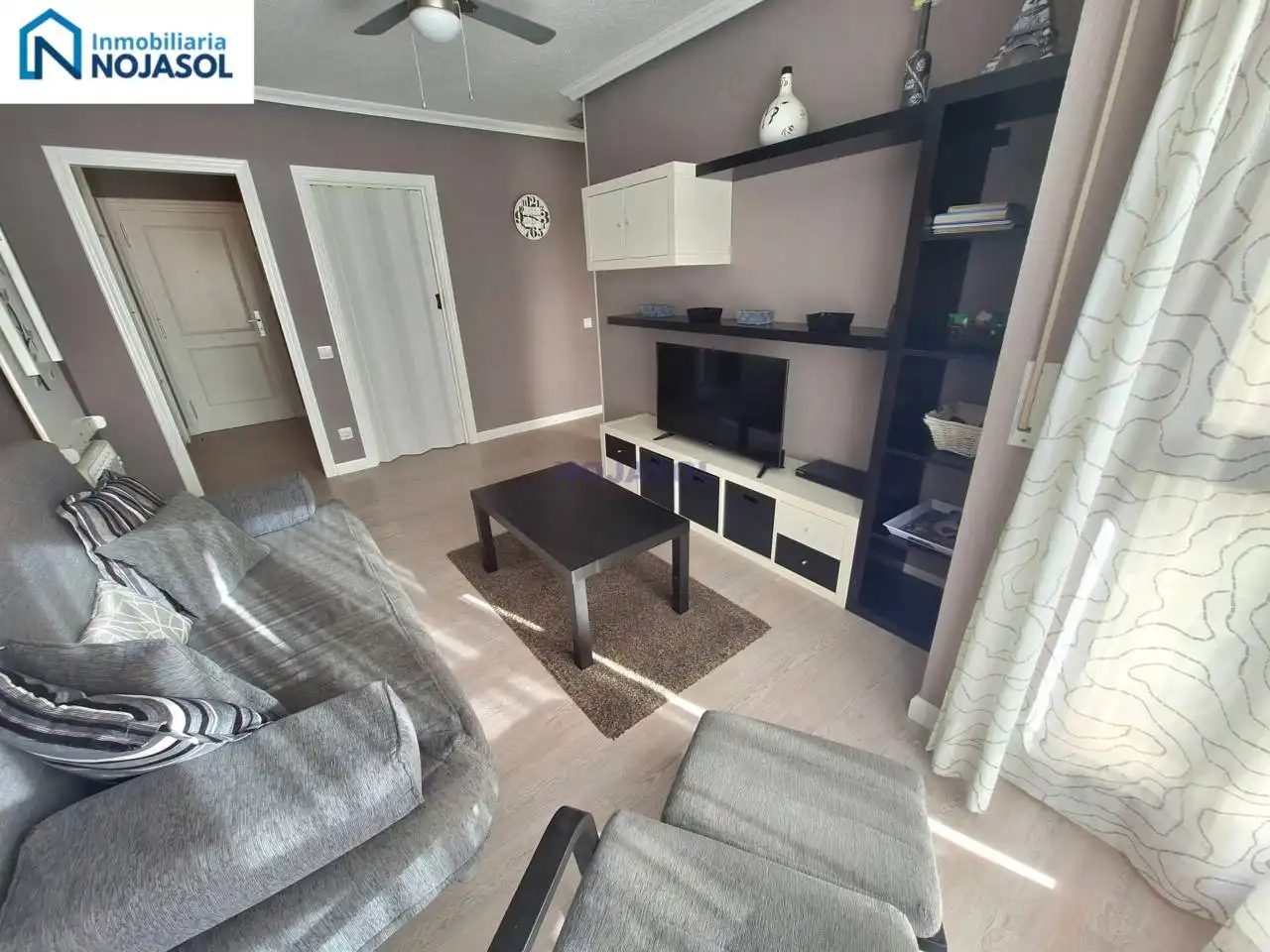 Sala de estar de Apartamento en venta en Noja con Calefacción, Parquet y Terraza