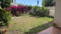 Jardí de Casa adosada en venda en Roquetas de Mar amb Aire condicionat i Jardí privat